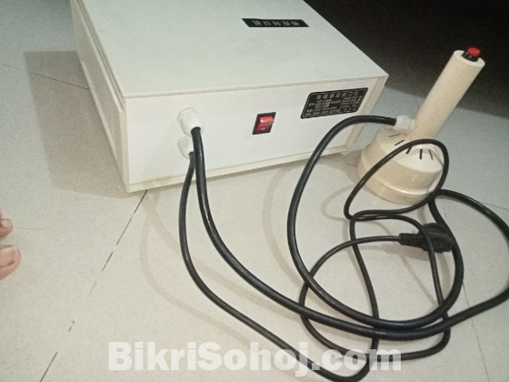 বোতলের মুখ লাগানোর মেশিন